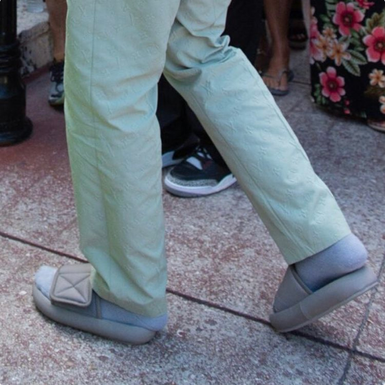 kanye wearing slides